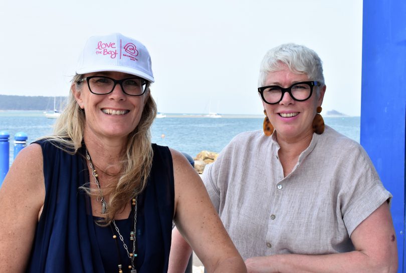Eurobodalla Mayor Liz Innes and Batemans Bay Tourism and Business Chamber President Alison Miers say buy local and help businesses get back on track after a tough start to summer. Photo: Supplied.