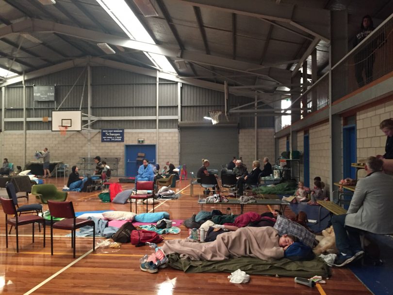 People sleeping and taking refuge in Moruya Basketball Stadium.