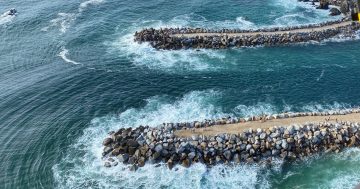 Body of second missing man found following boat overturn at Narooma