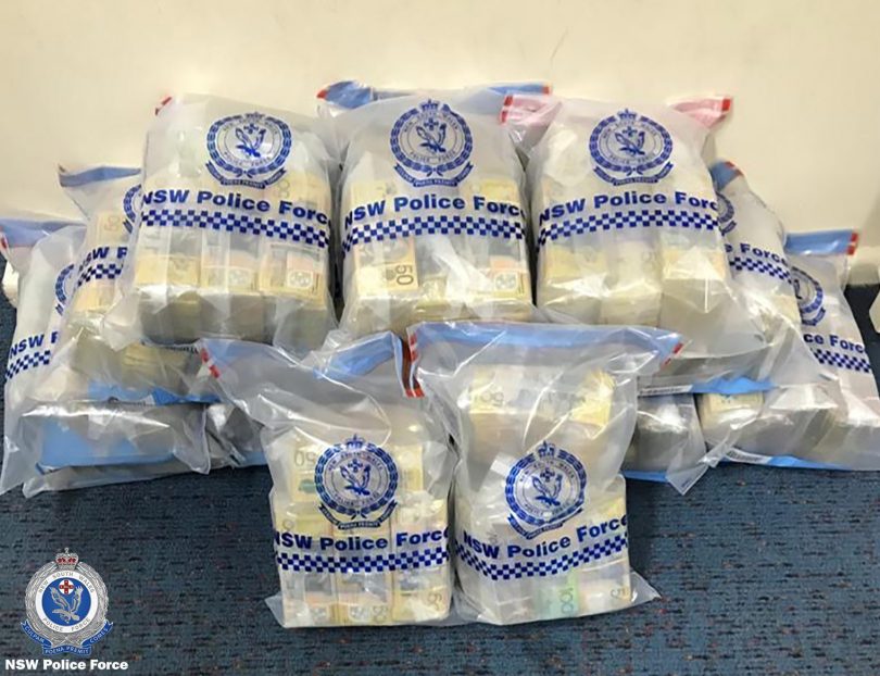 Bags of cash seized by NSW Police.