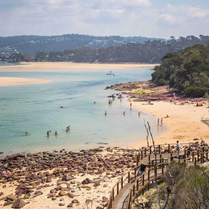 Merimbula's Bar Beach and surrounding landscape.