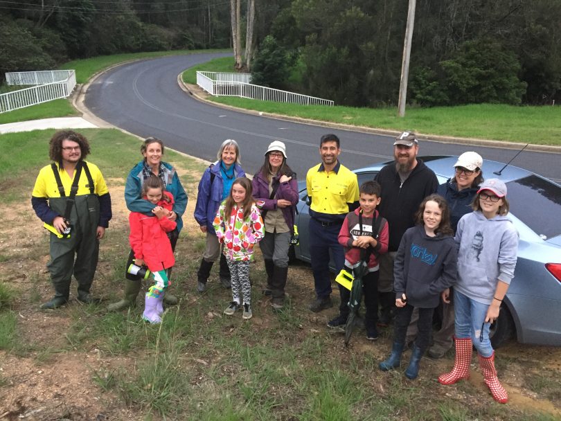 The Benjamin family, Council staff and the Eurobodalla Natural History group pose by roadside.