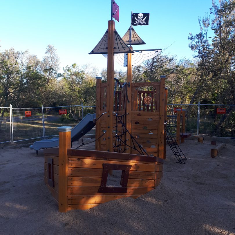 Wooden pirate ship playground at Lions Park in Tathra.