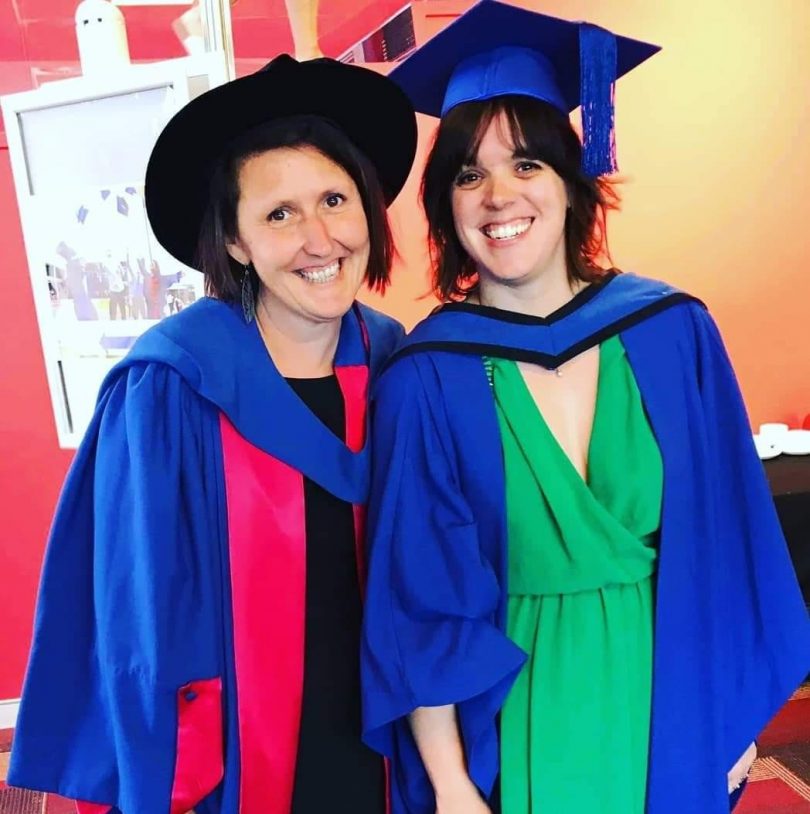 Emily Martin (right) and fellow graduate Dr Annie Werner (left) on their graduation day at University of Wollongong's Bega campus in 2016.
