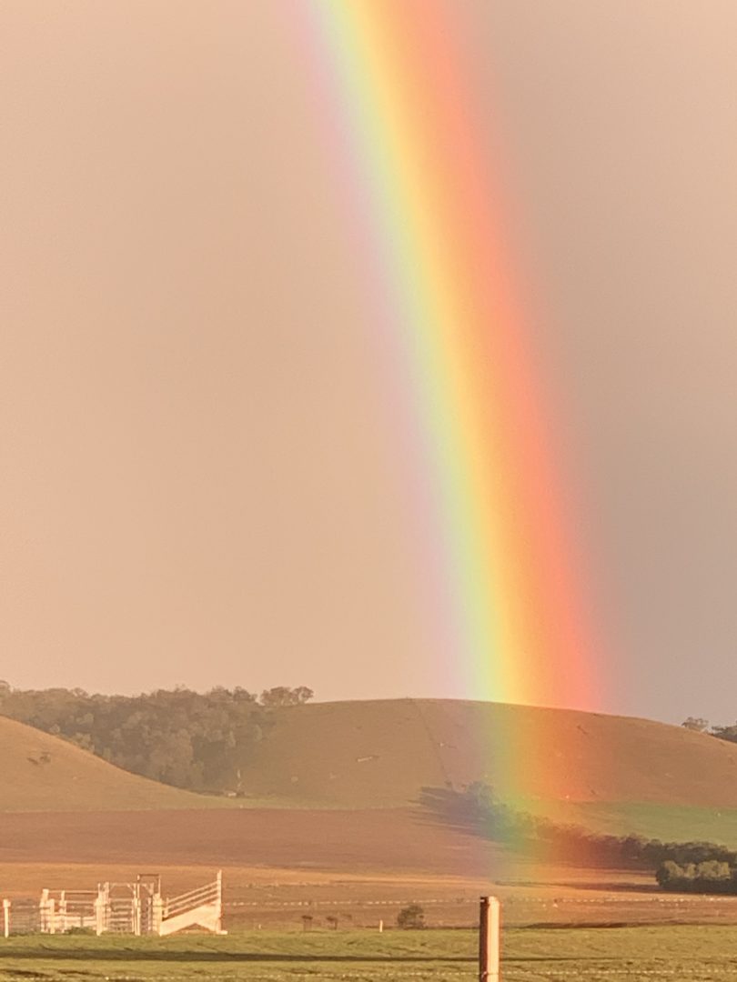 A rainbow over paddocks near Braidwood