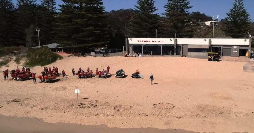 Aerial photo of lifesavers on beach in front of Tathra Surf Life Saving Club.