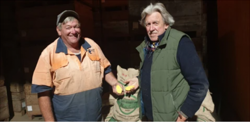 Garry Kadwell and Wentworth Hill holding Andean Sunrise Potato.