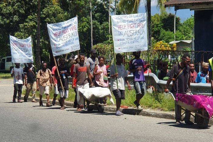 Youth of Lae City members walking the streets fundraising to help fight bushfire recovery in Australia.