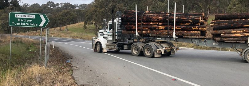 Logging truck turning onto Snowy Mountains Highway from Batlow Road.