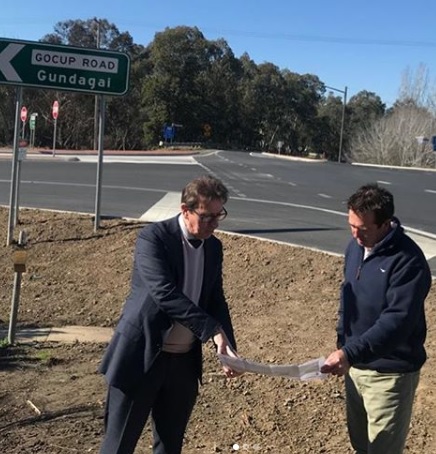 Dr Joe McGirr (left) and Paul Toole (right) standing at intersection of Gocup Road and Snowy Mountains Highway in Tumut.