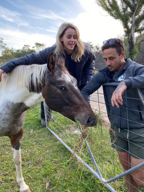 Man and woman with Molly the horse.