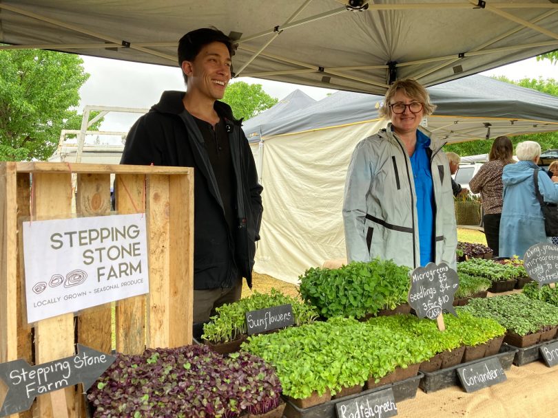 Joshua Gowers and Shani Keane at Stepping Stone Farm stall at SAGE Farmers Market in Moruya.