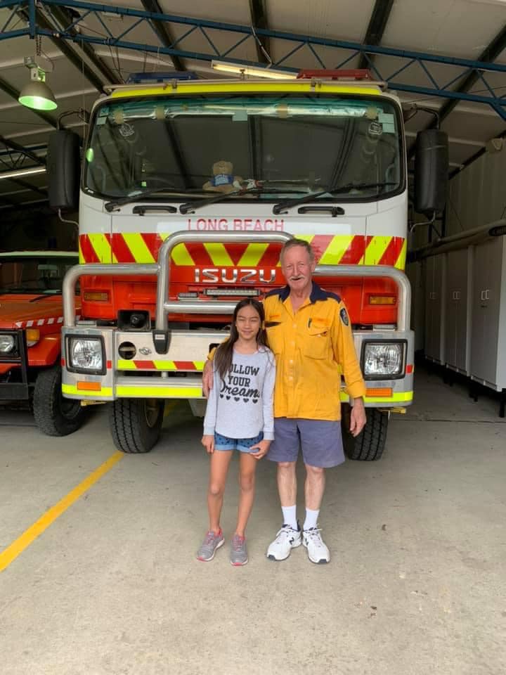 Emerald Smith with Rod Simpson at Long Beach Rural Fire Service shed.