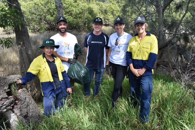 Deb Lenson, Nick Lyons, James Ward, Sally McIntosh and Heidi Thomson cleaning up wetlands at Mackay Park.