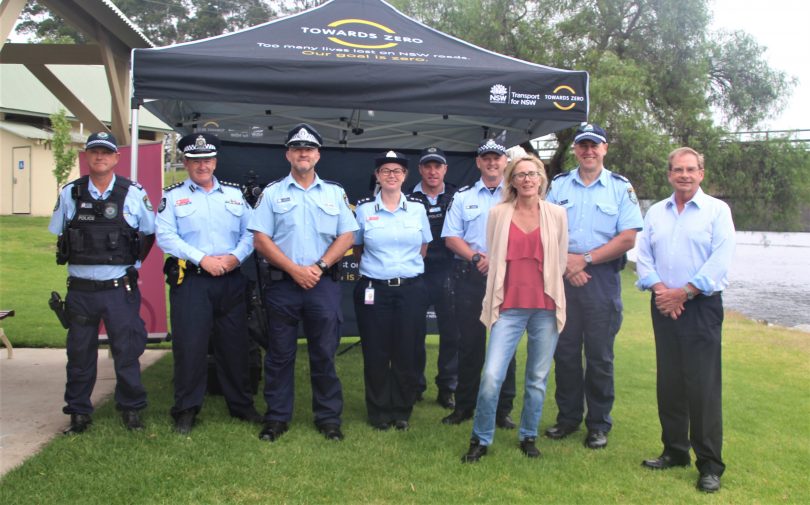 Officers from Australian Federal Police and NSW Police, with Liz Innes and Tim Overall.