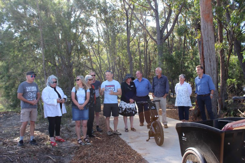 Andrew Constance and community members stand on the new Tathra to Kalaru Bike Track.