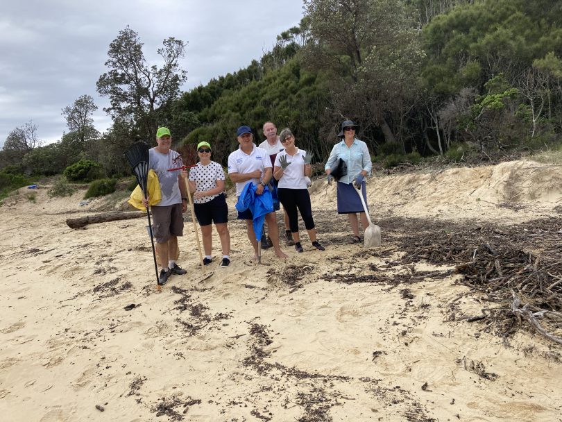 Residents cleaning up Shelly Beach.