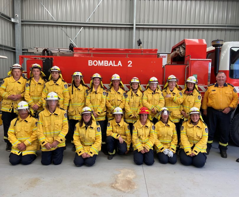 Goetz Graf with cadet firefighters from Bombala High School in front of firetruck.