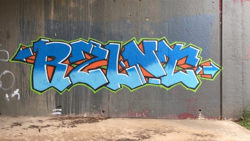 Jade Roche's trademark tag 'RZLNT' painted on the free graffiti wall in Yass.