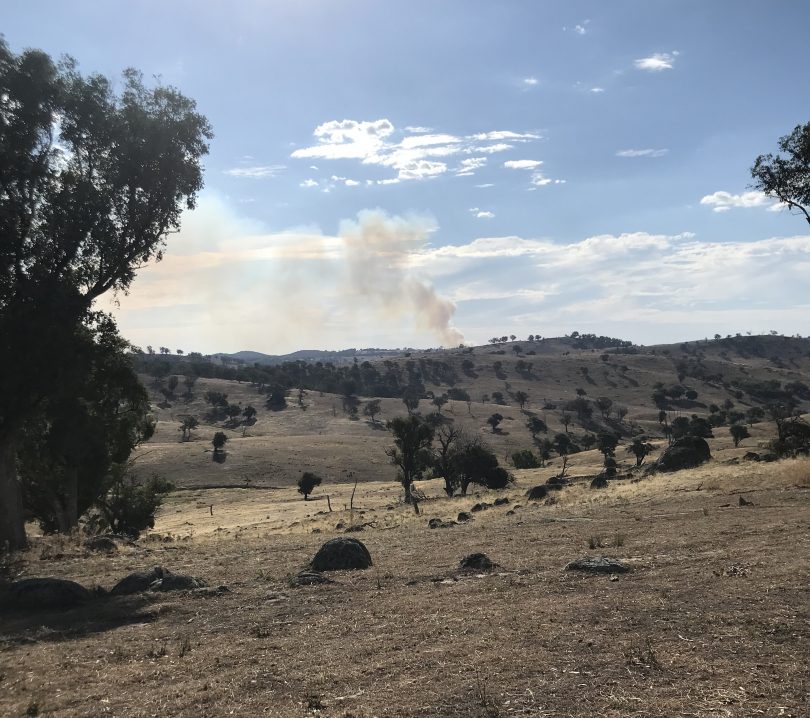 An out of control fire burns in inaccessible scrub in the Hilltops region of NSW.
