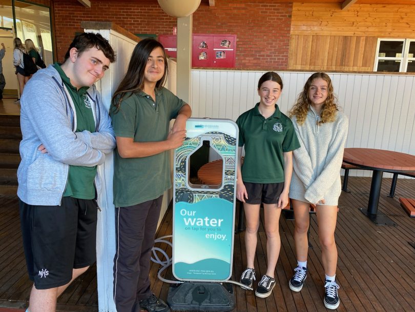 Narooma High School students standing around a water bubbler