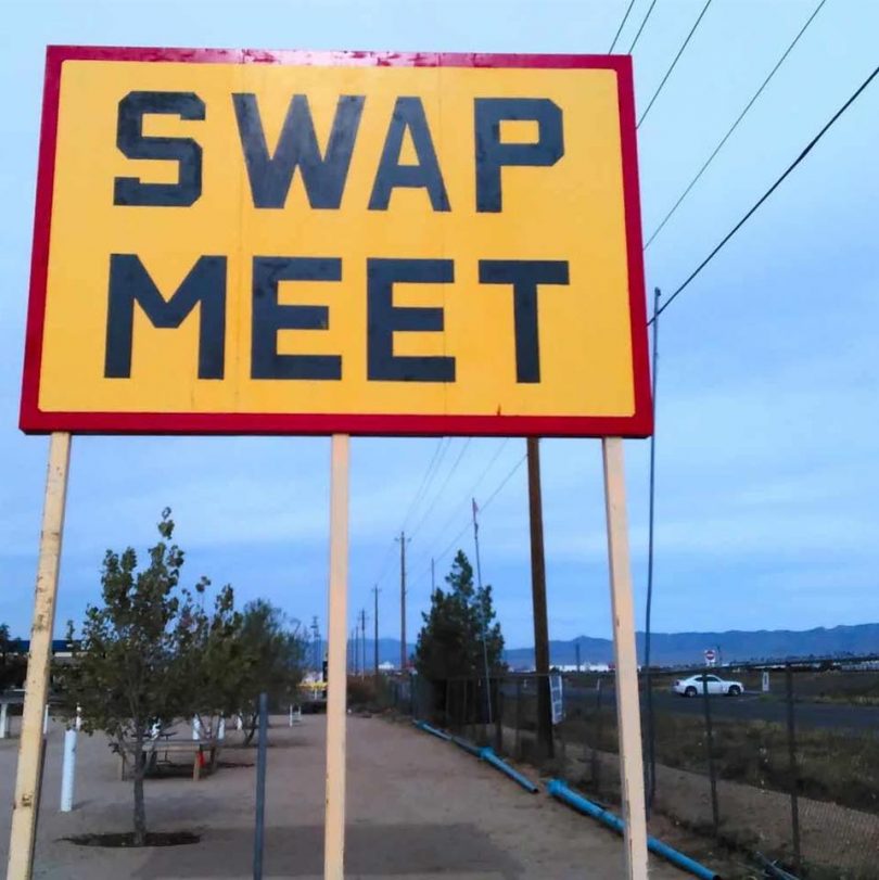 Sign reading 'Swap Meet'