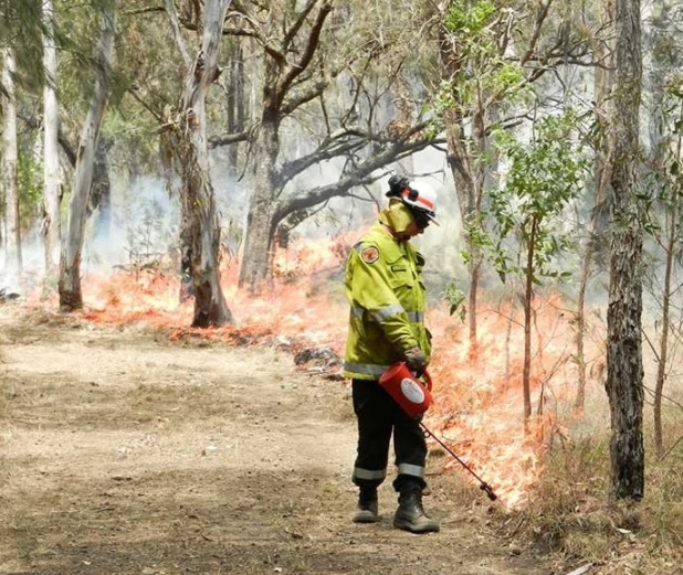 NSW Rural Fire Service worker conducting bush hazard reduction burn