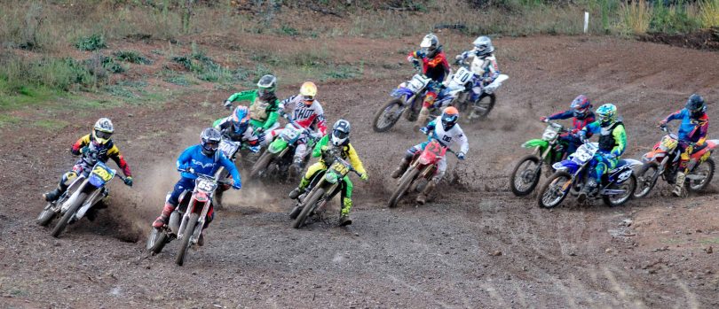 Group of dirt bike riders on track