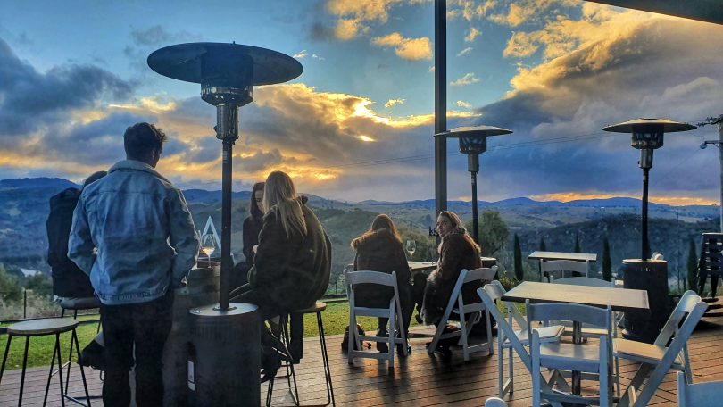 People at Van Du Vin winery at sunset
