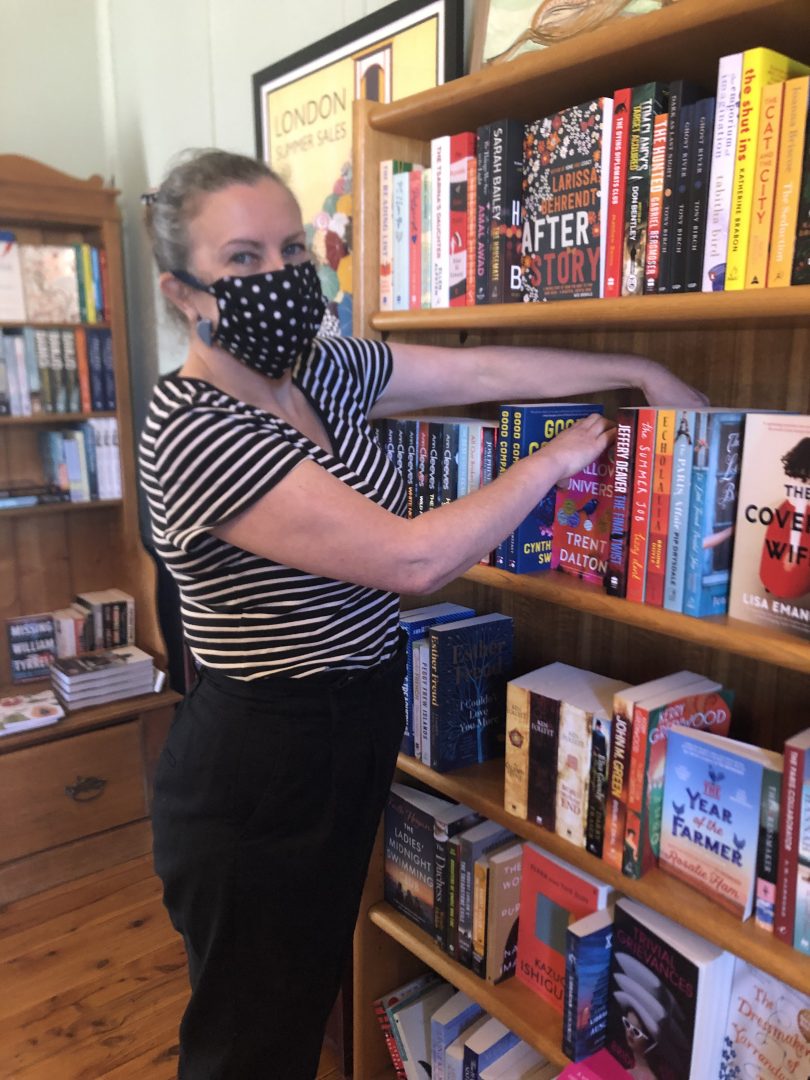 Joanna Hicks tidies up the library at Yass Bookstore