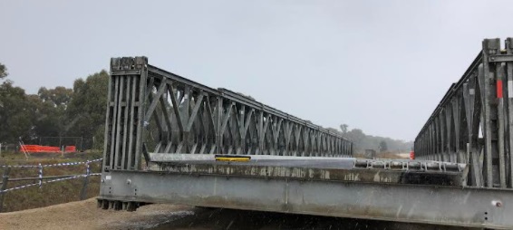 Construction site of temporary railway overpass bridge on Burley Griffin Way