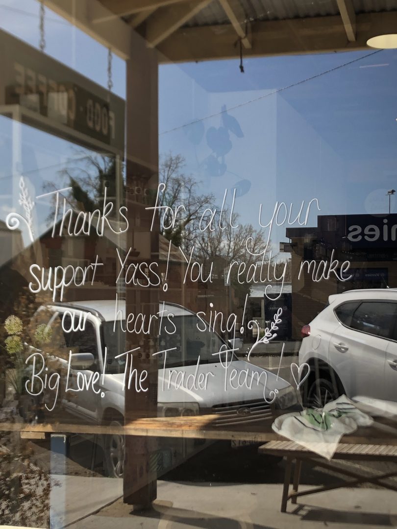 Thank-you message written on front window of Trader and Co in Yass