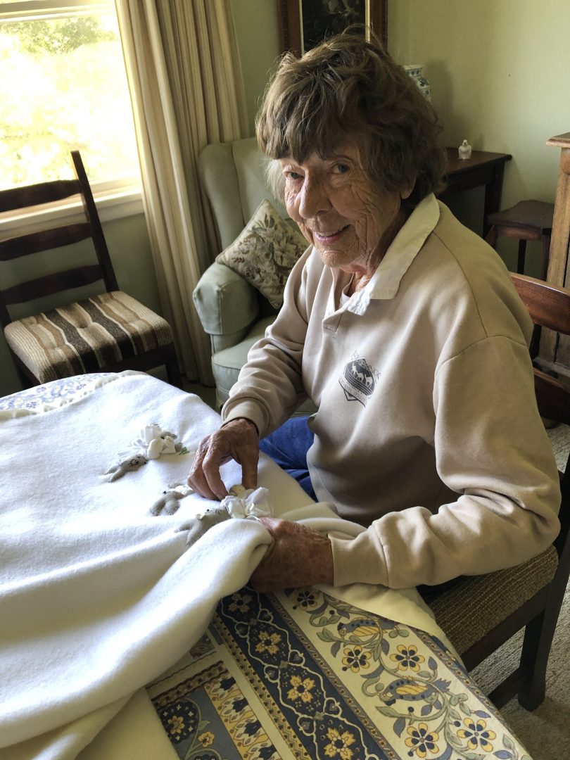 Barb Shannon sewing heirloom blanket