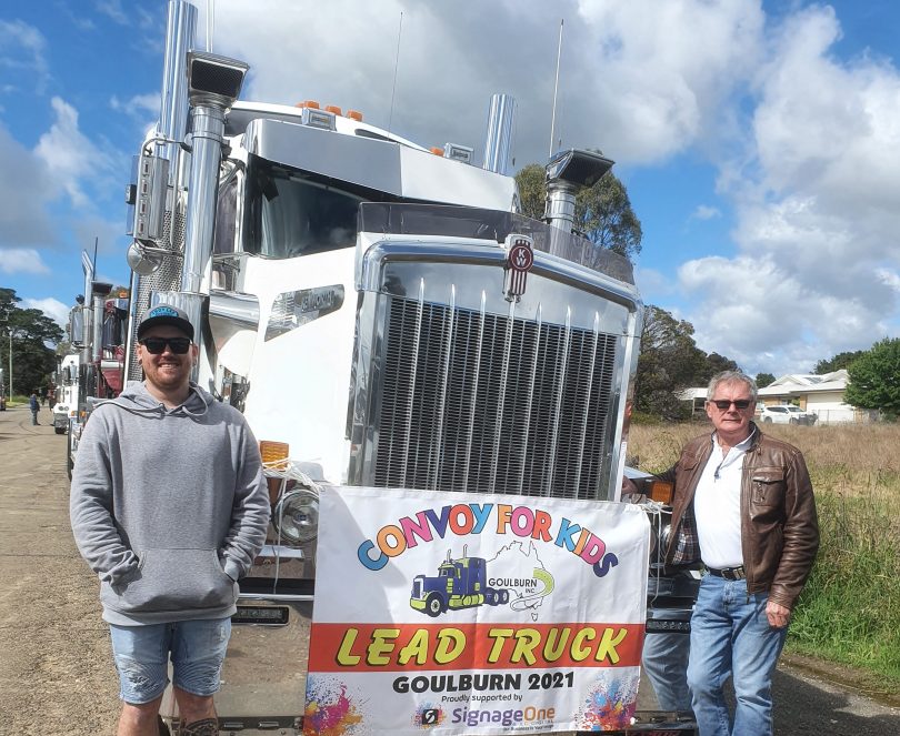 The lead truck position auction for the Mystery Drive was won by Warwick Burrows right), with his son Mark driving the truck.