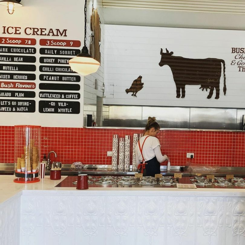 Interior of a milk bar, including a list of ice-cream flavours