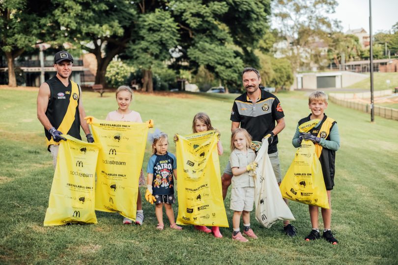 People holding bags for Clean up Australia Day