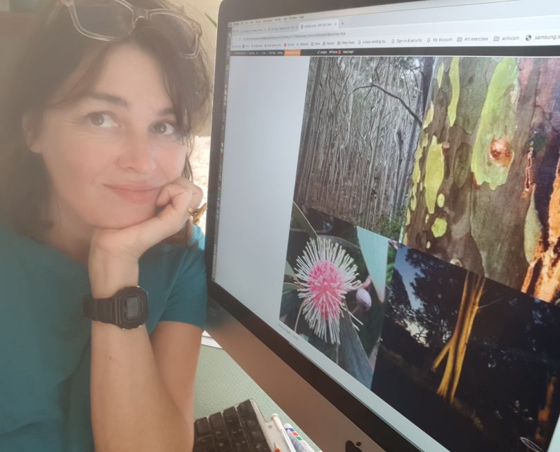 Woman in front of computer screen