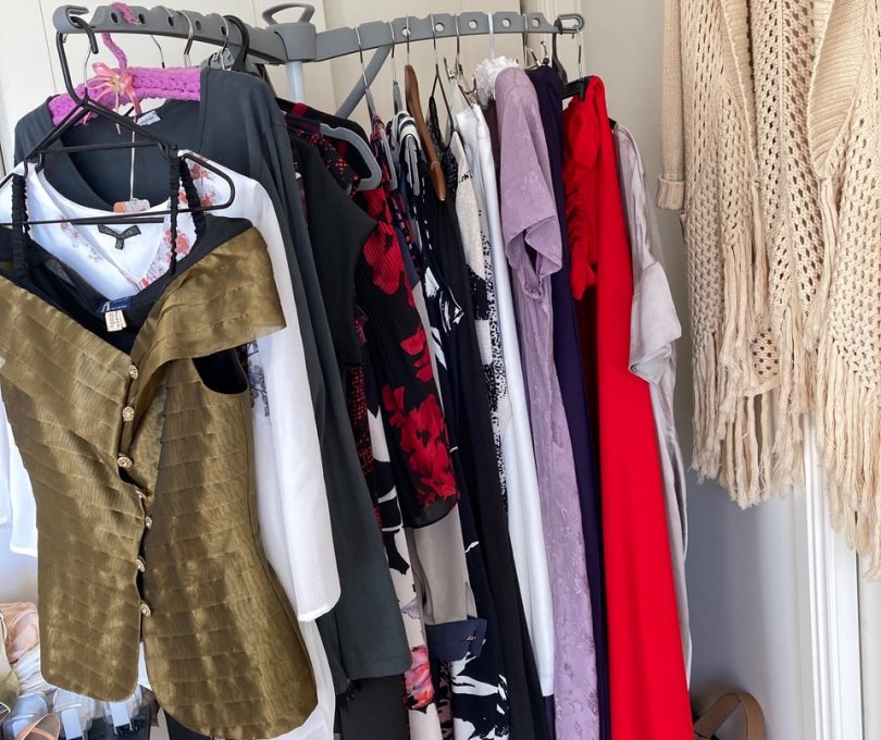 Designer second-hand clothes on a rack
