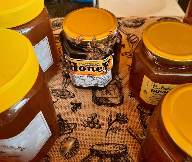 Bees on honey jar