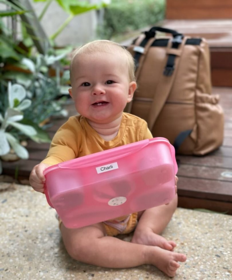 Baby with a lunchbox