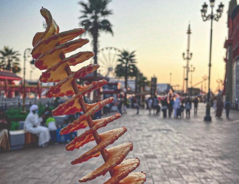 A spiralled potato on a stick