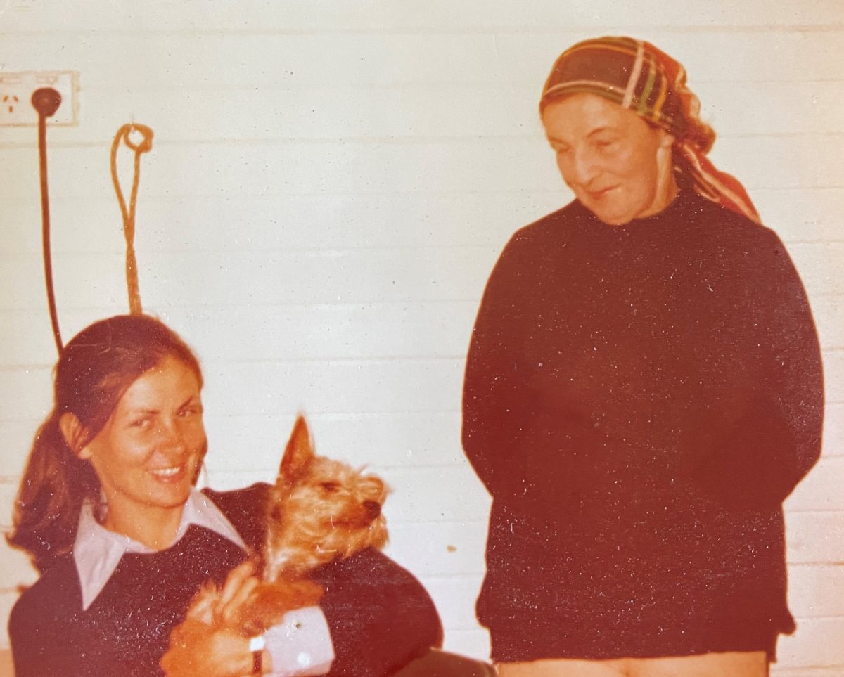 Two women and a dog