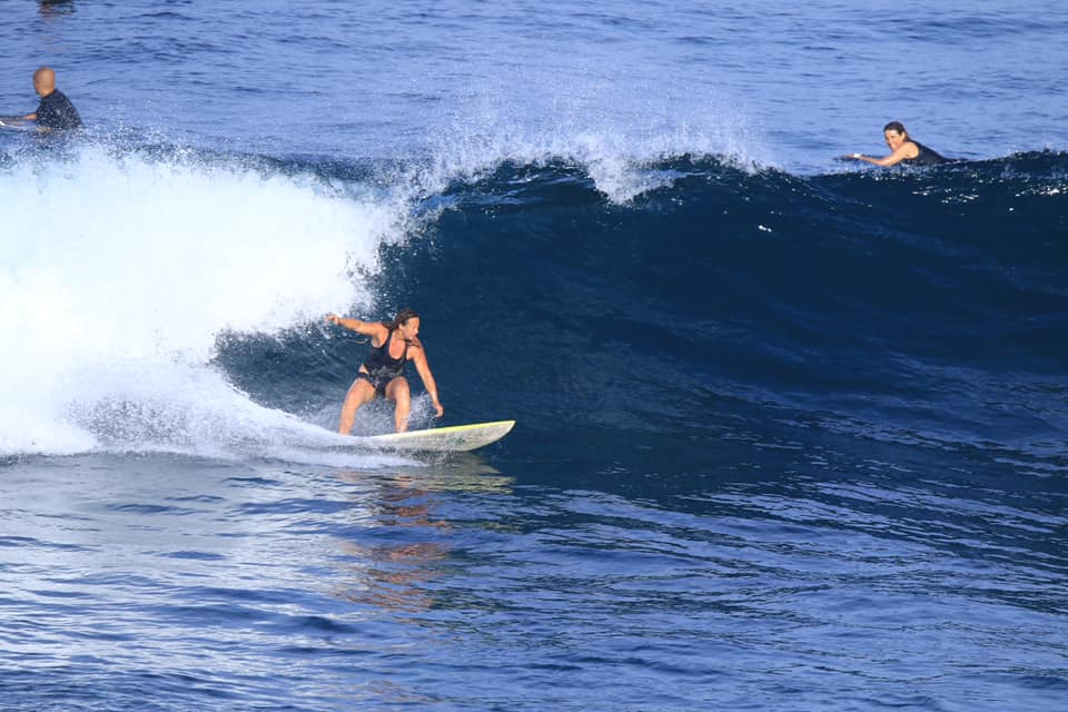 Priscilla Hensler surfing