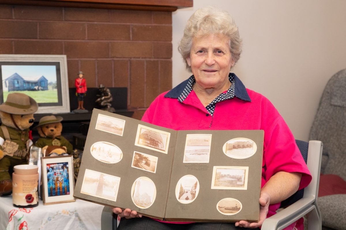 Woman with old photo album