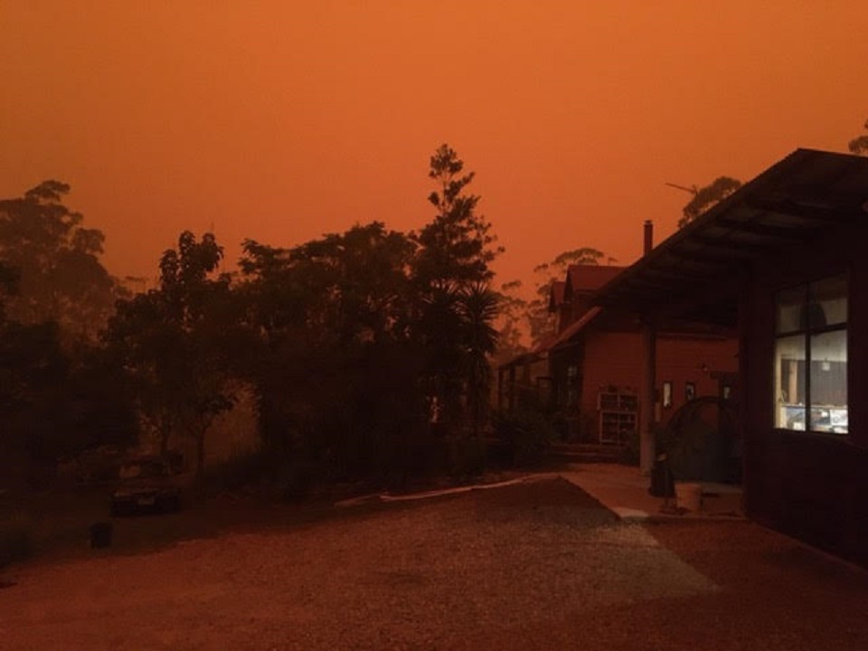 The smoke from the bushfires darkened the sky over a home on the Far South Coast on New Year's Eve 2019.