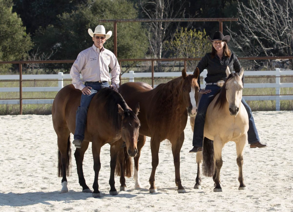 Man and woman riding horses