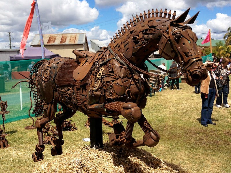 Horse sculpture made of rusty metal parts