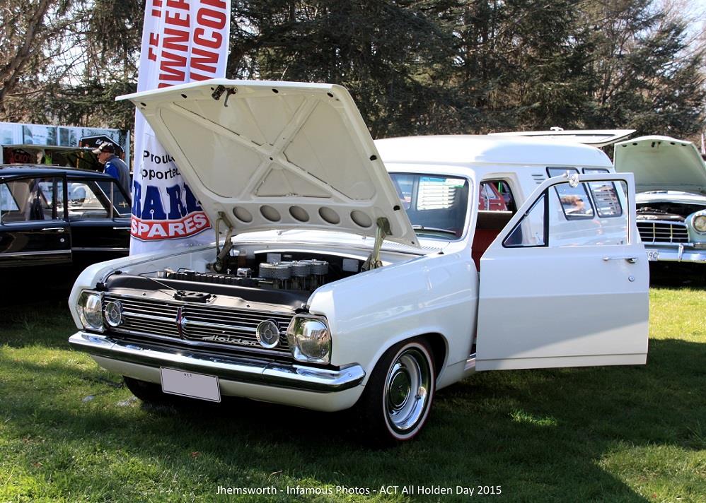White classic Holden with hood up