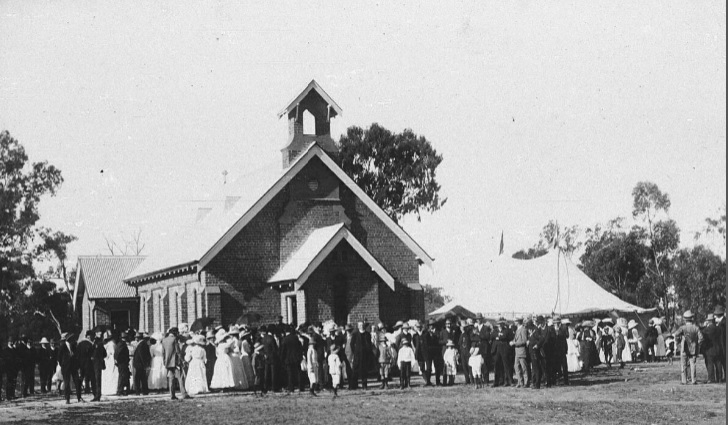 A crowd outside a church 