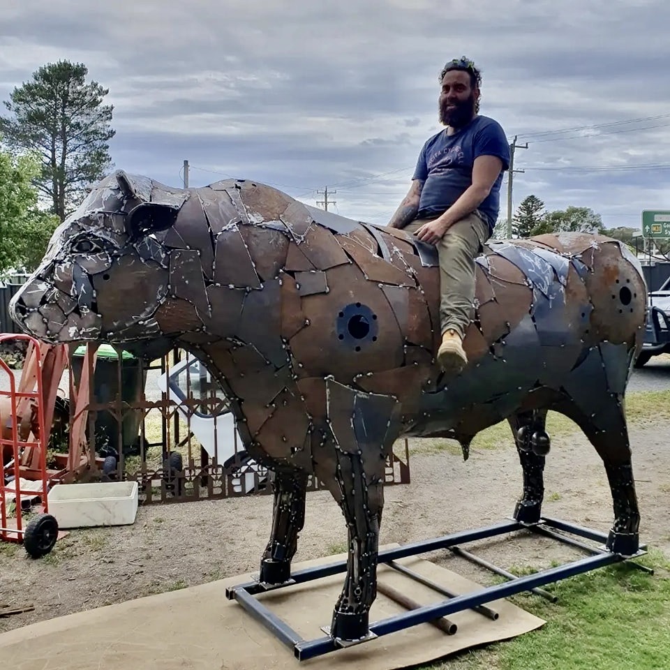 man on bull sculpture